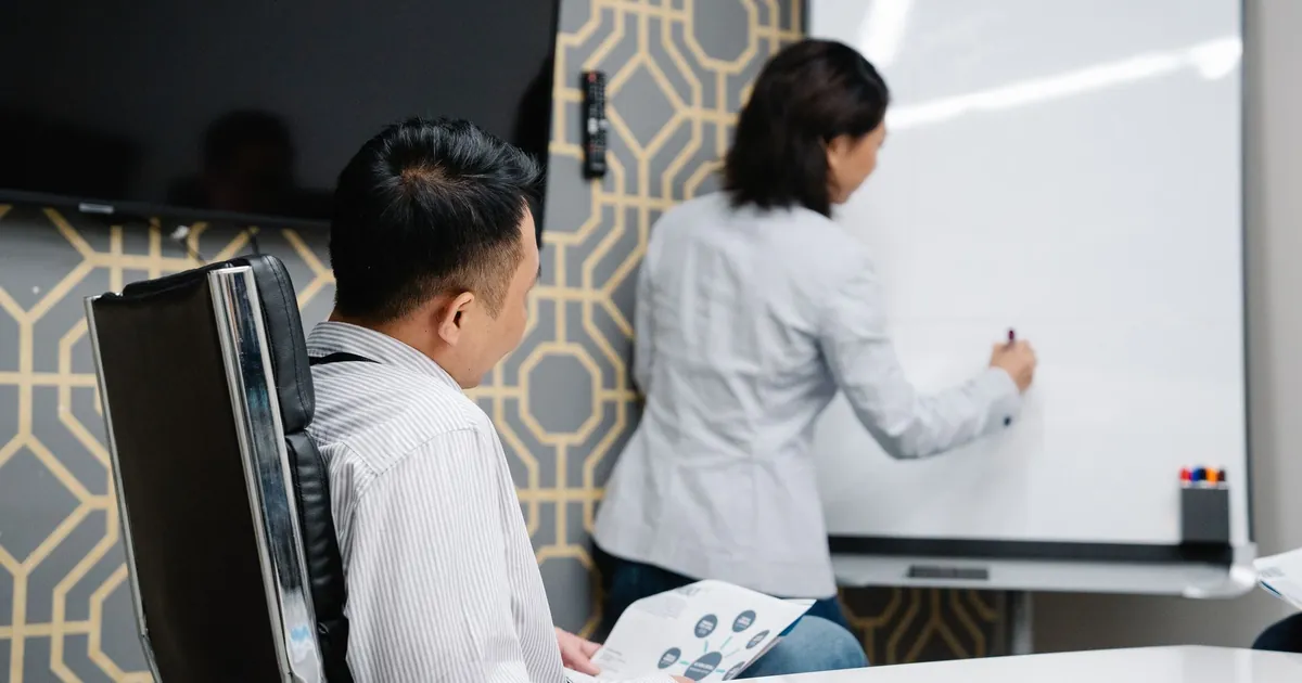 Write the region map before you replicate. The whiteboard is the control Team mapping cloud data residency on a whiteboard before choosing regions