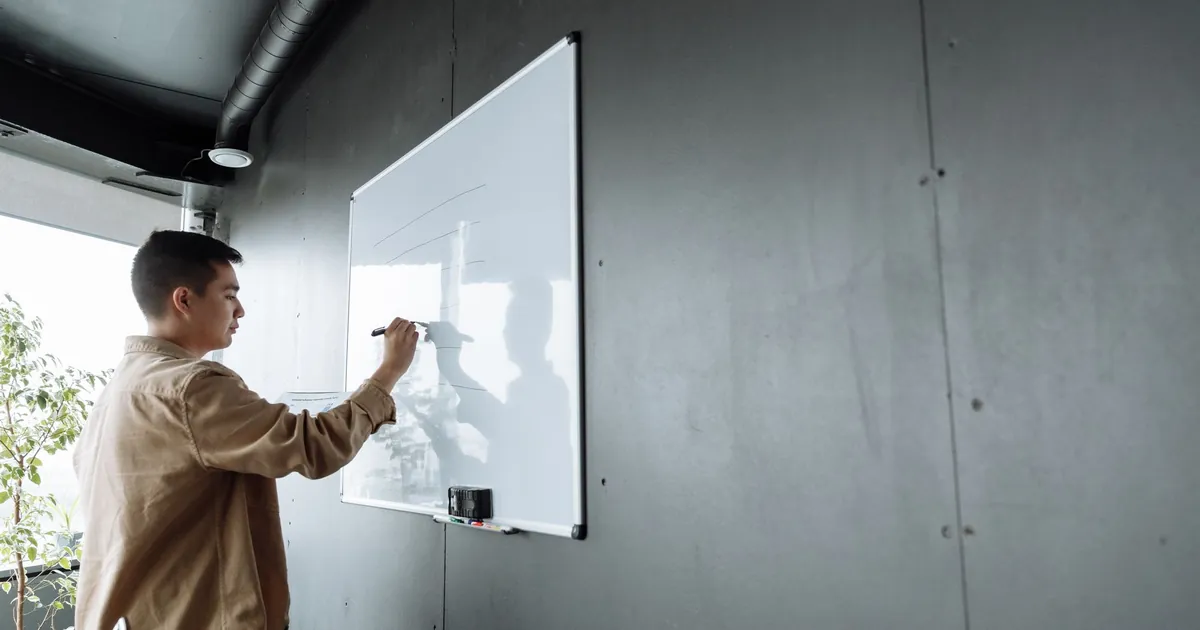 Retention and DR are part of the residency design, not a later surprise Person documenting cloud backup retention and recovery rules on a whiteboard
