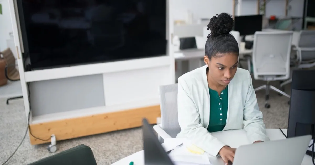 Trained employees are your strongest line of defense Employee using a laptop after security awareness training