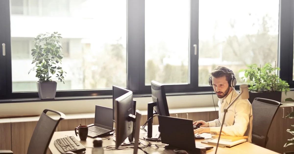 Technician proactively maintaining office computers