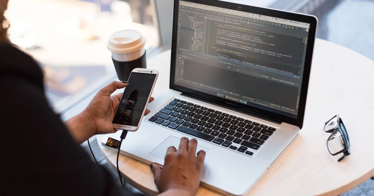 Intune can manage the laptop and protect work apps on the phone Laptop and phone used together for work email