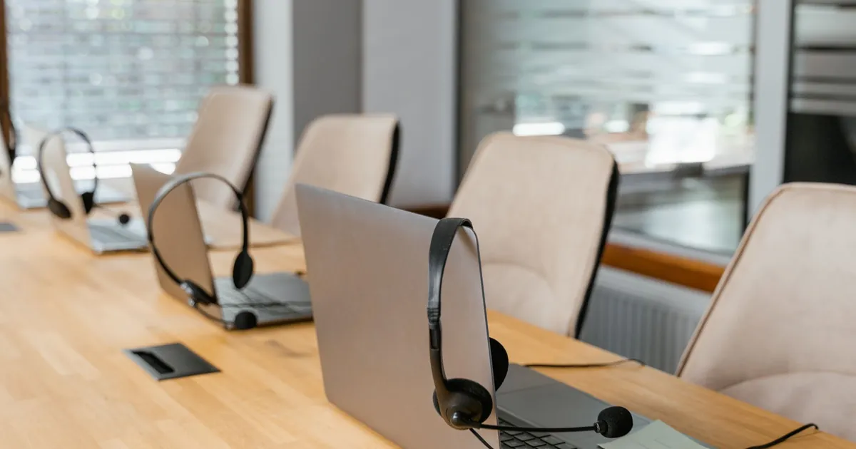 Remote worker with headset and laptop