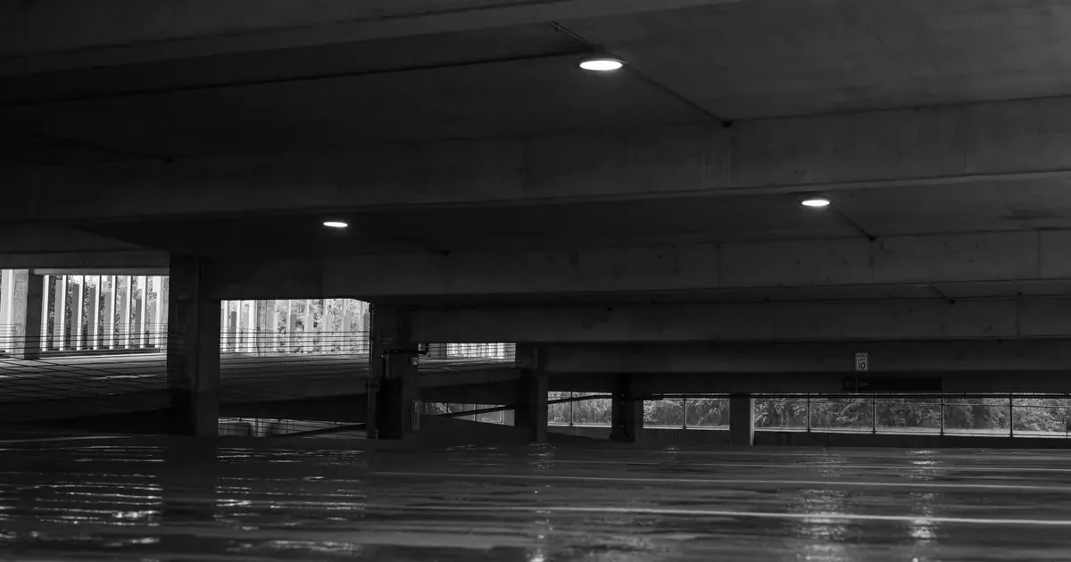 Open parking lots give thieves many targets and easy escape routes Aerial view of a parking lot that needs surveillance coverage