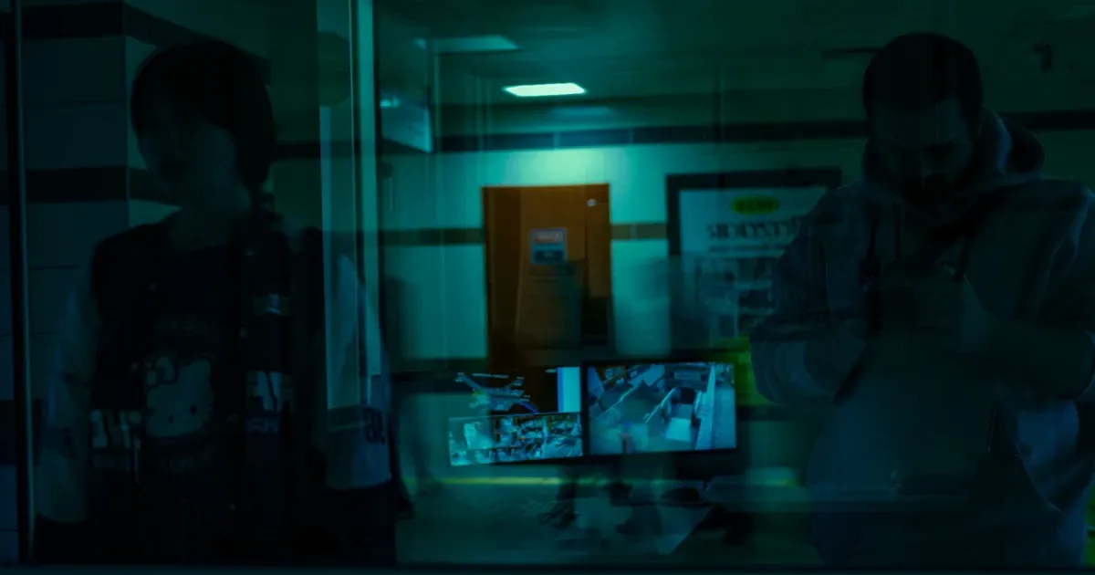 Live monitoring center with security camera displays