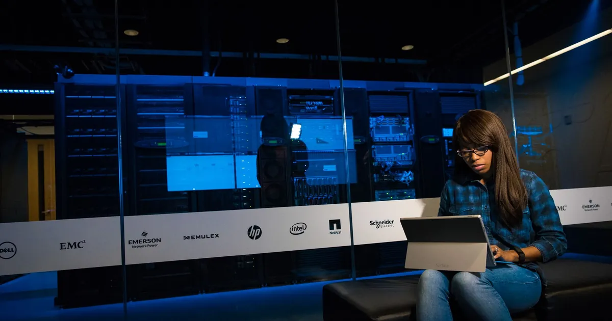 Keep high-value logs. Sample or drop the rest Laptop in a server room standing in for high-volume cloud and host logs