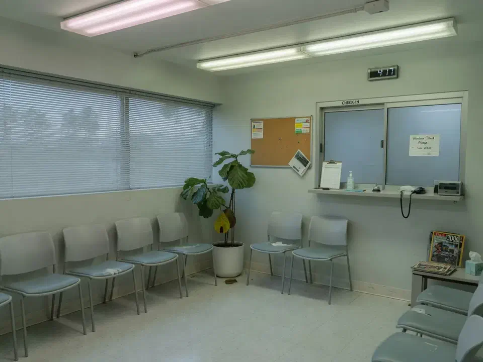 Empty medical clinic waiting room and check-in window