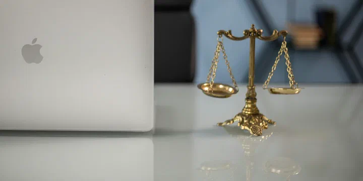 A Law Firm Paying for Silence